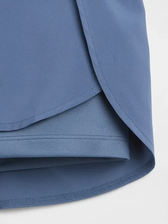 Schnelltrocknende Laufshorts für Kinder mit Schmetterlingssaum