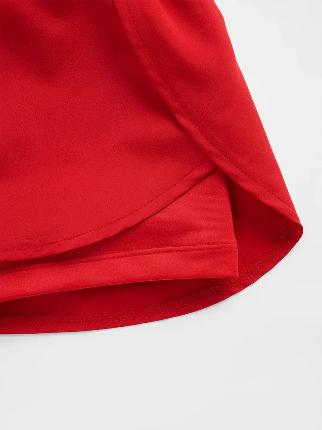 Schnelltrocknende Laufshorts für Kinder mit Schmetterlingssaum