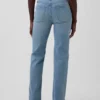 Slim-Straight-Jeans im 90er-Jahre-Stil mit hoher Leibhöhe und verdrehten Nähten