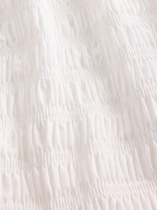 Smock-Peplum-Oberteil für Kinder