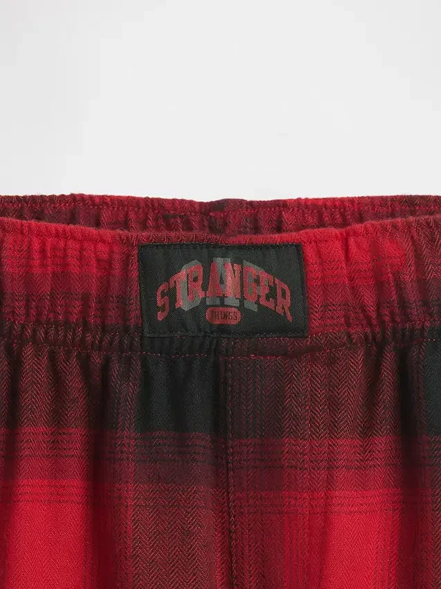 „Stranger Things“ Kinder-Pyjama-Hose aus recyceltem Flanell