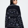 Strickjacke aus Baumwollmischung mit Fransen und Schalkragen