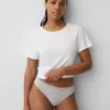 Tanga aus Bio-Stretch-Baumwolle mit Spitzenbesatz
