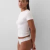 Tanga aus Bio-Stretch-Baumwolle mit Spitzenbesatz
