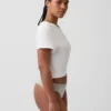 Tanga aus Bio-Stretch-Baumwolle mit Spitzenbesatz