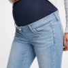 Umstandsmode-Jeans mit echtem Bund, durchgehendem Einsatz und abgenutzten Details, Skinny-Schnitt, Knöchellang